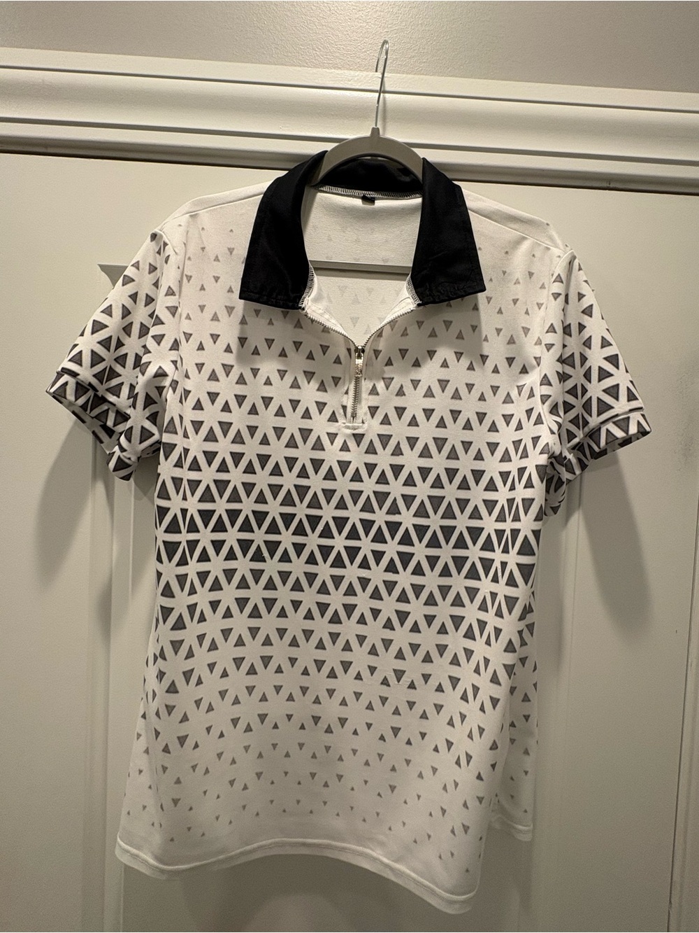 White Short Sleeve Polo with Black Collar and Geometric Triangle Print